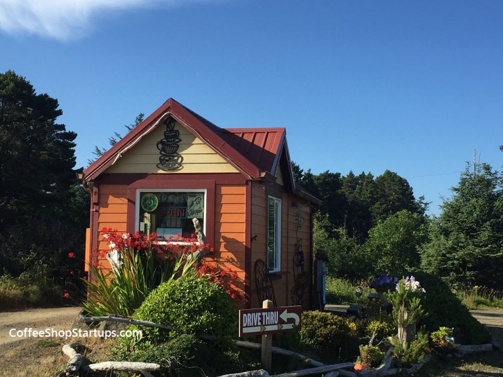 A colorful drive-thru coffee stand