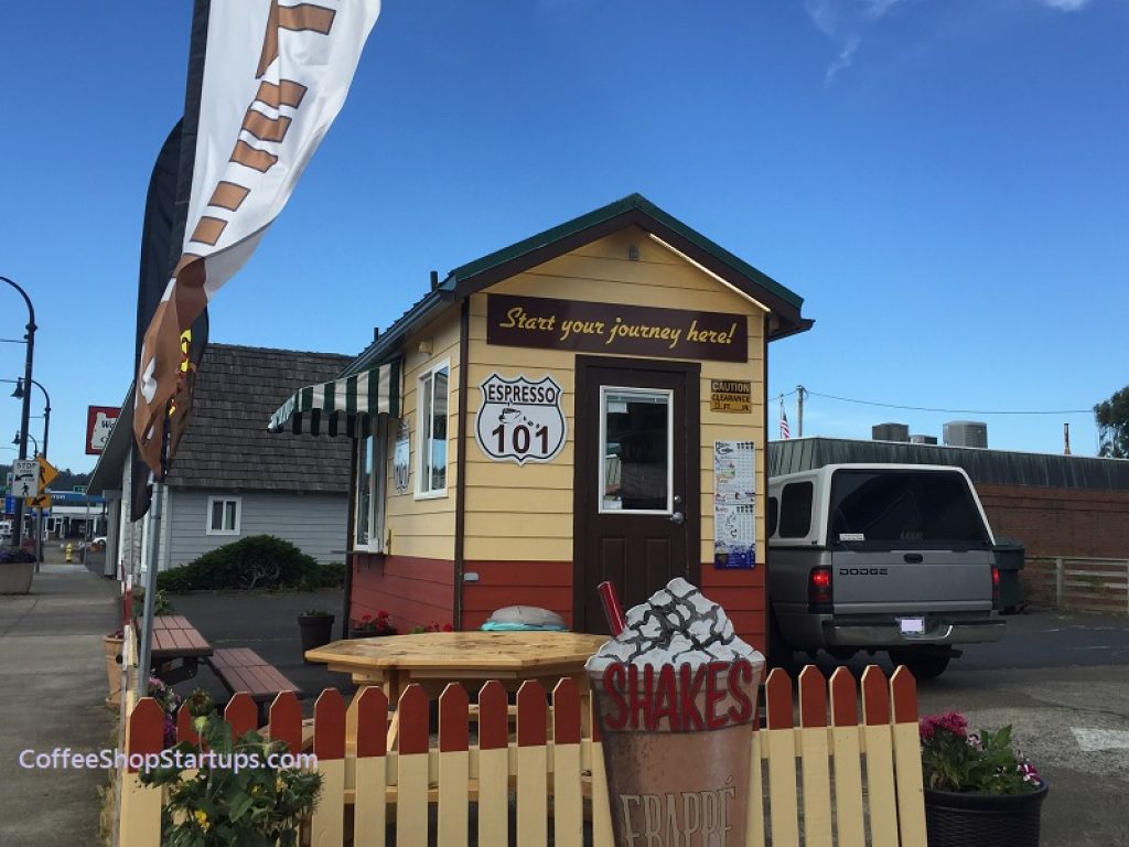 A road side drive-thru coffee stand business helping customers