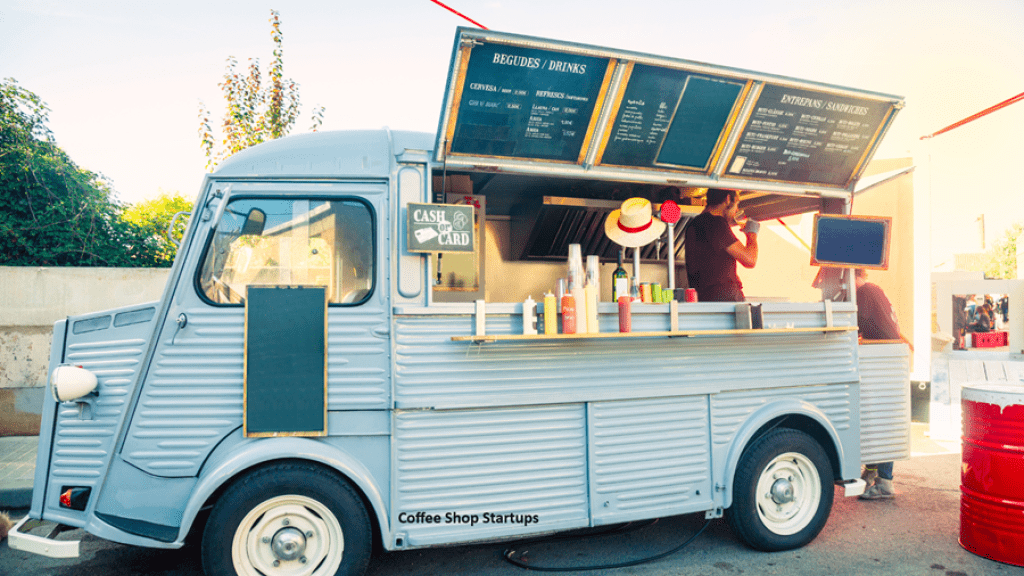 A coffee truck setups at an event.