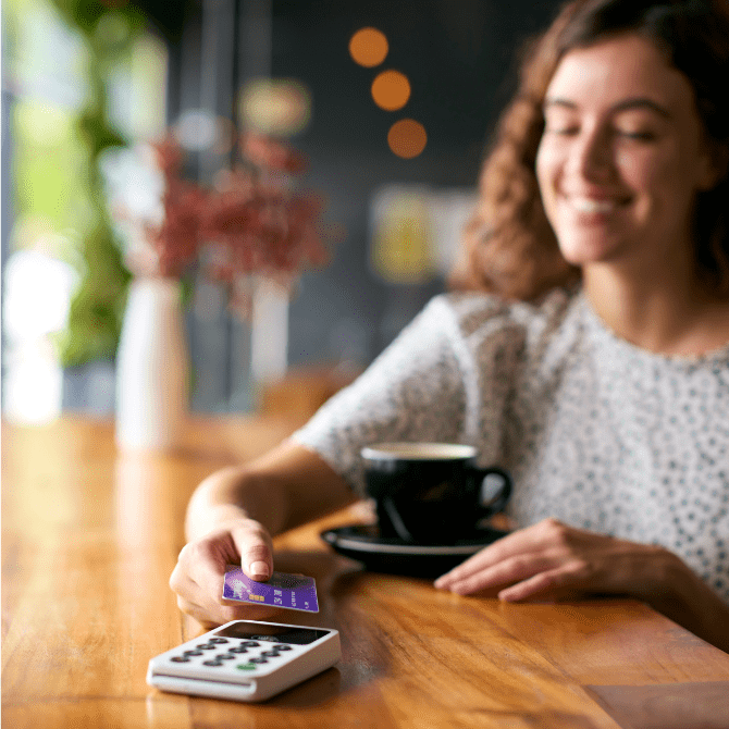 Coffee shop cost and revenue. A barista charges for a coffee.