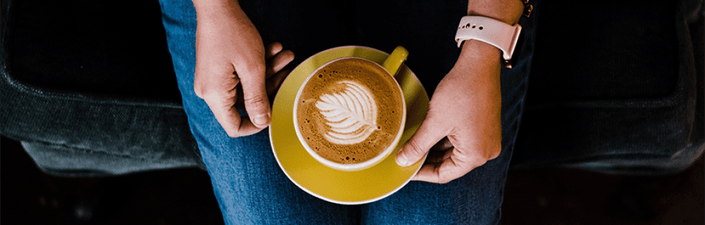 https://coffeeshopstartups.com/wp-content/uploads/2021/05/latte-art-at-a-coffee-shop-1024x328.png