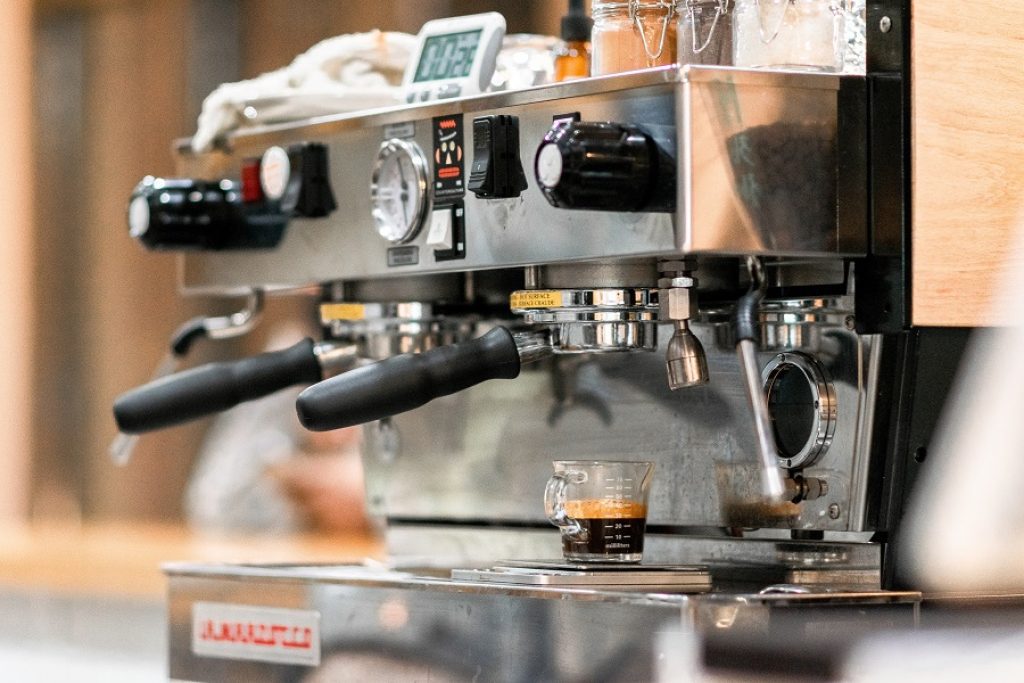 A two-group espresso machine works