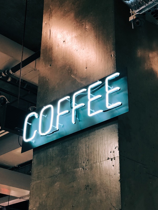 coffee shop security - a neon coffee sign at night