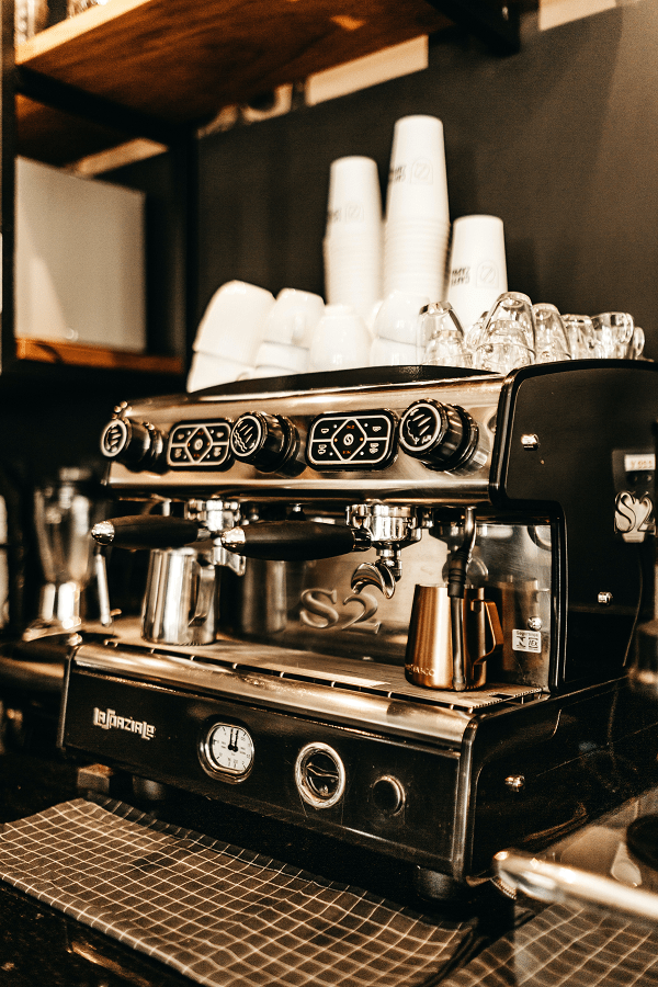 An espresso machine serves coffee in a small town 